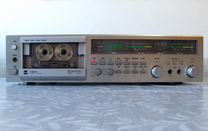 Старошкольная топовая трёхголовочная кассетная дека Dual C844 (2 фото из 10)