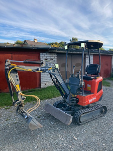 Müüa komplekt Ekskavaator Everun ERE-12 Pro ja kallurhaagis (1 foto / 10)