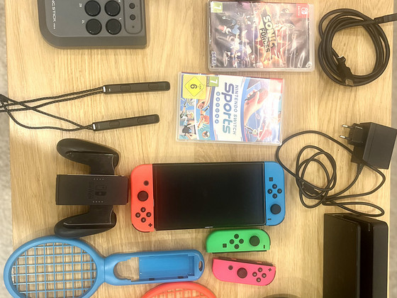 Nintendo Switch OLED + lisad