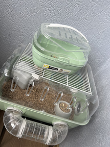 Hamster koos puuriga (2 foto / 2)