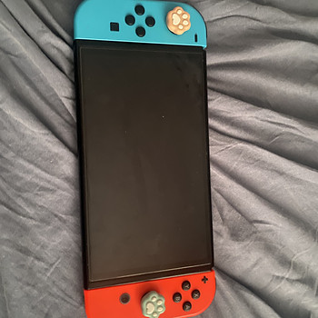 Nintendo Switch OLED + Super Mario Odyssey