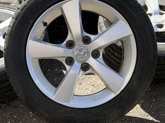16" Mazda originaalveljed 5x114,3 + suverehvid 205/55/16 5mm