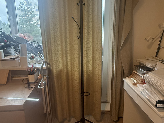 Black metal standing coat rack