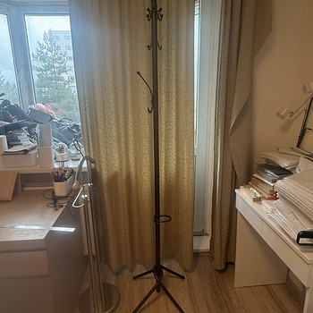 Black metal standing coat rack