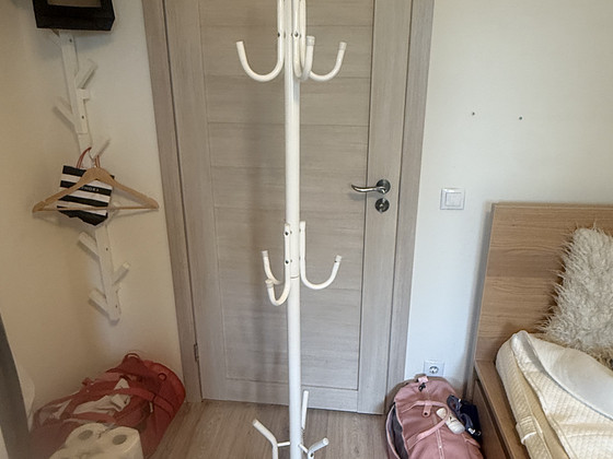 White metal standing coat rack