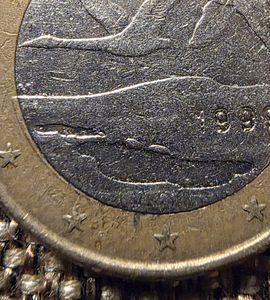 1 евро Финляндии 1999 года. Дефектный с обеих сторон. (2 фото из 10)