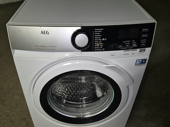 Pesumasin AEG L7FEU947E 9kg 1400p/min
