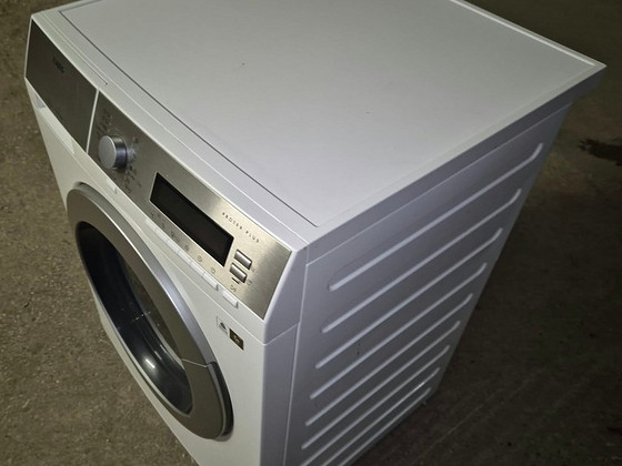 Стиральная машина с сушкой AEG L87695WD 9 кг и 7 кг