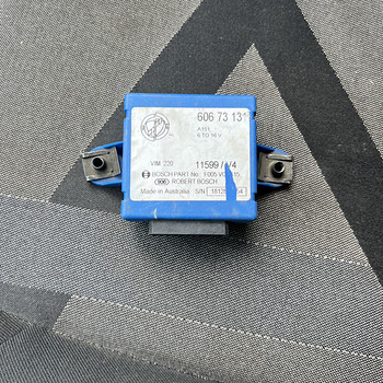 Автомобильный электронный модуль Bosch F005V00115 60673131
