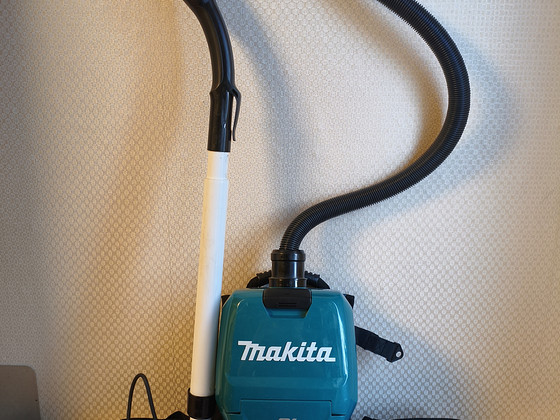 Makita tolmuimeja DVC260 ZX seljakott akutolmuimeja