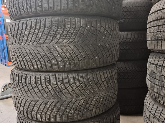 Шипованные шины 284/40R22