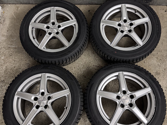 16" диски Dezent 5x108 с шипованными шинами