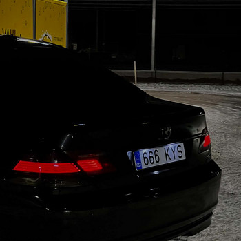 BMW E65/E66 дорестайлинговые тонированные задние фонари Hella