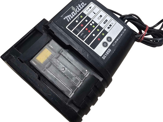 Laadija Makita DC18SD