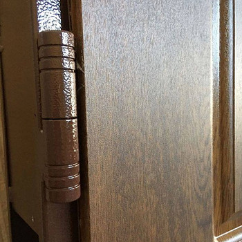 Metāla ārdurvis privātmājām ar Vinorit platņu apdari