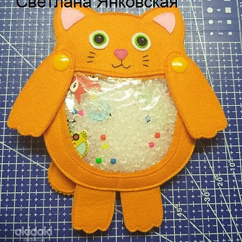 Розвиваюча іграшка-іскалочка Рудий котик з фетру