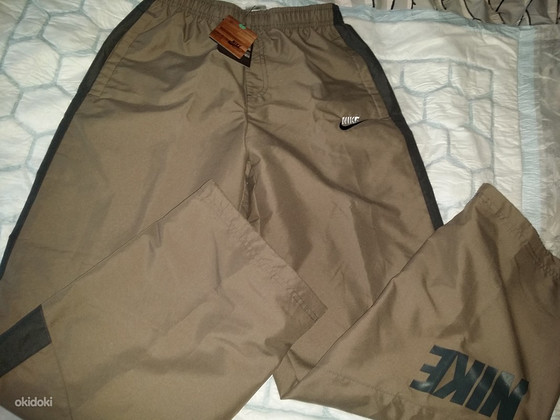 Новые штаны S Nike