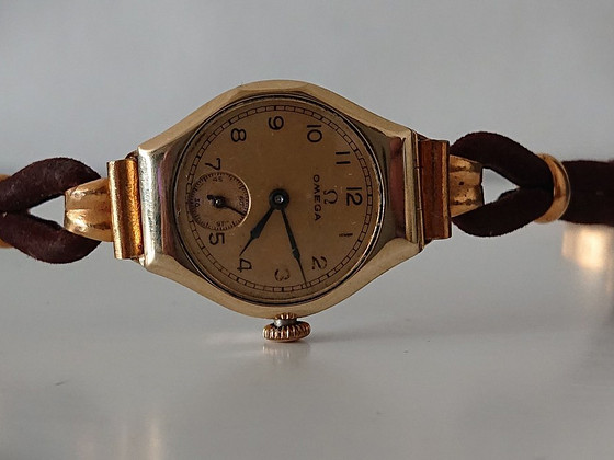 Omega 14 krt